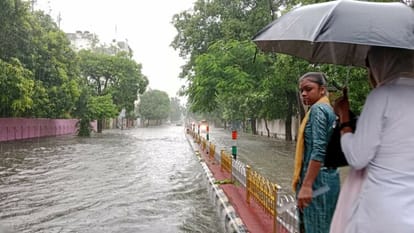 Rampur submerged, houses filled with water, boat plying on roads