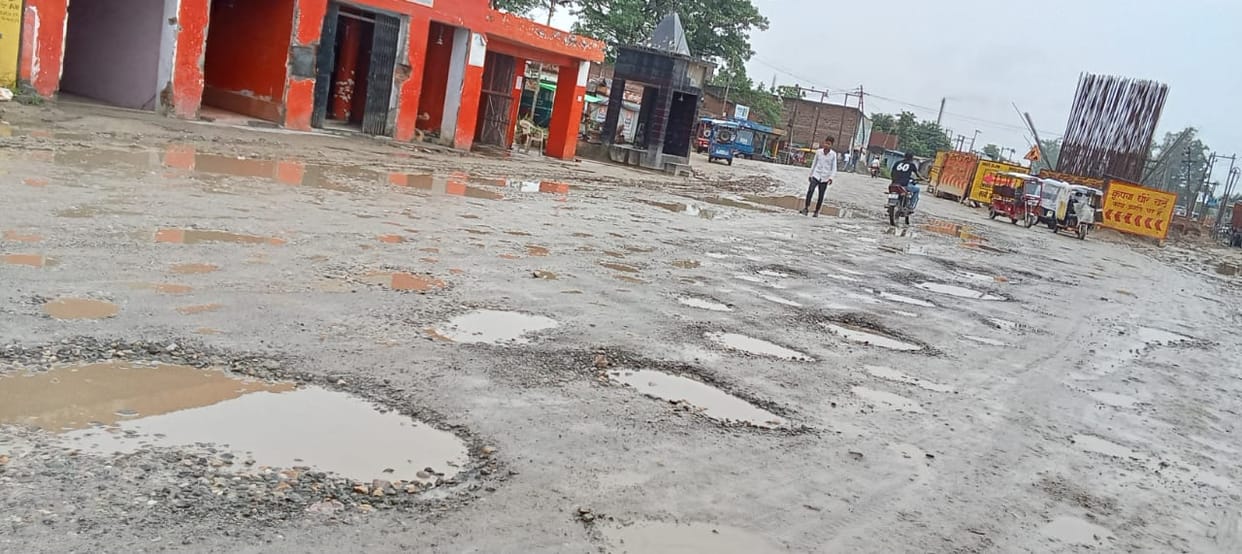Potholes in service lane of flyover at Assam intersection