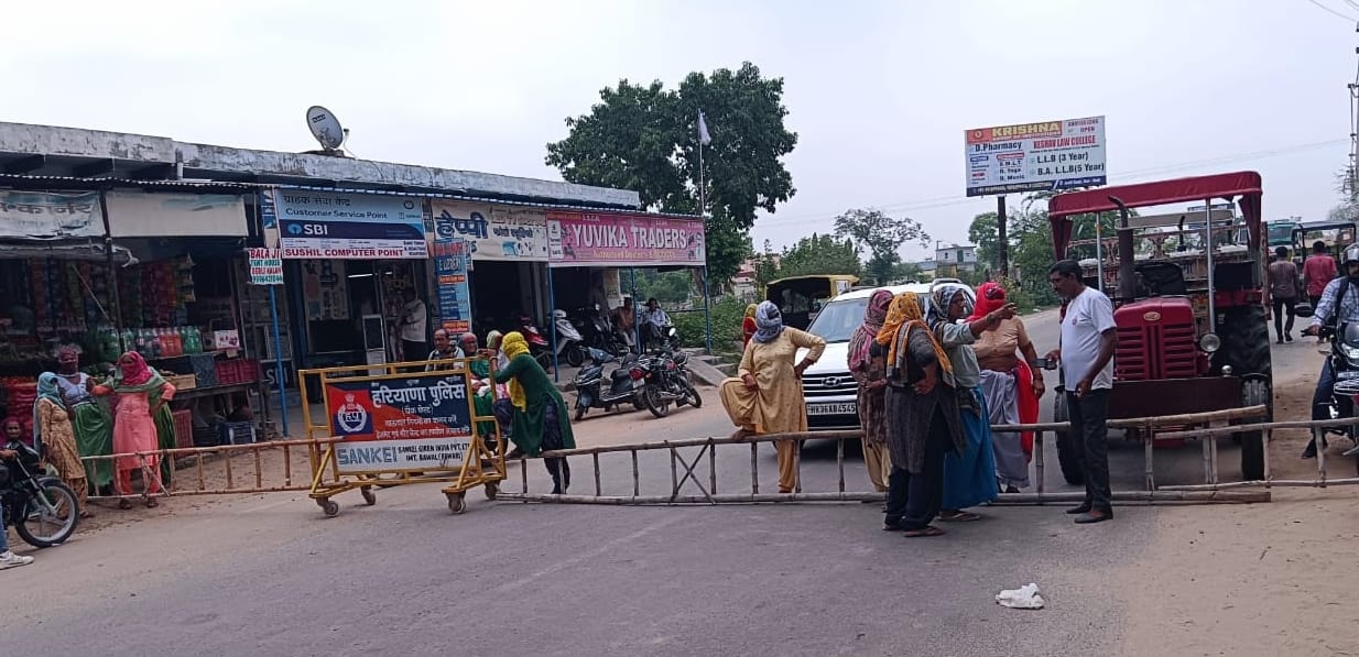 Troubled by the lack of water supply, the women jammed