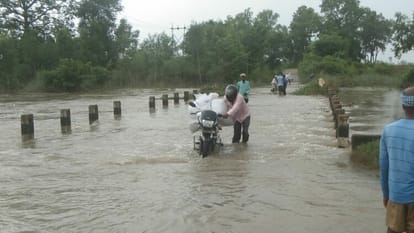 The sliding bridge built on the Rampur Bourakh road was submerged in water