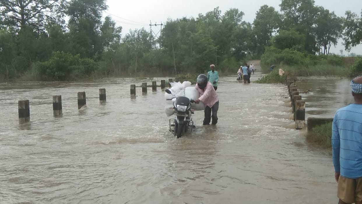 The sliding bridge built on the Rampur Bourakh road was submerged in water