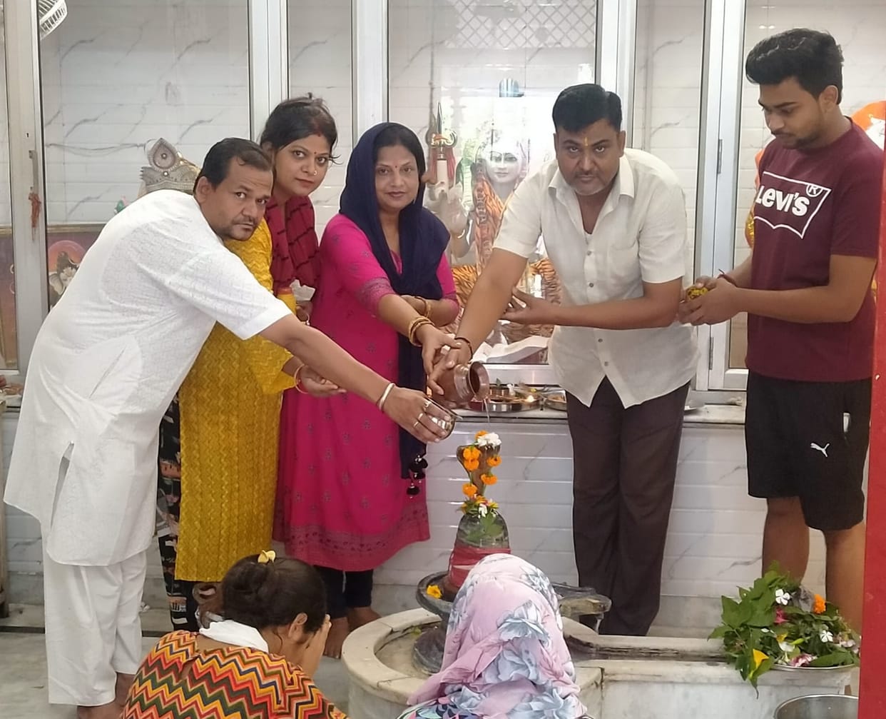 Devotees kept fast, worshiped in temples and performed Jalabhishek
