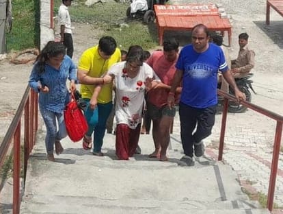 Elderly woman jumps into Ganga, divers save her life