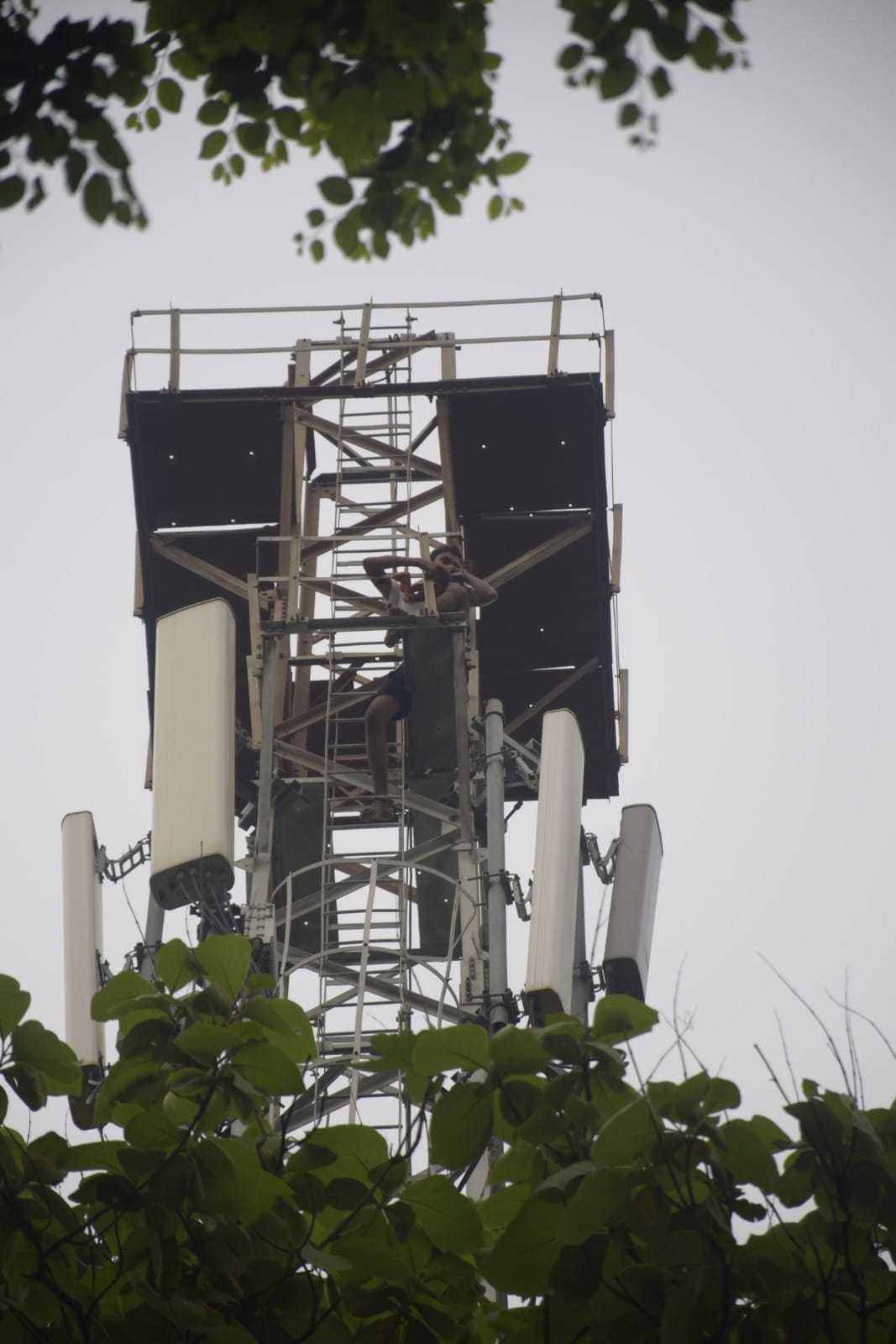 climbing a mobile tower for marrigae in gorakhpur