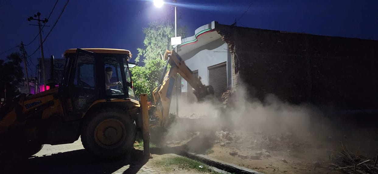 Police made bulldozer run at the house of the accused
