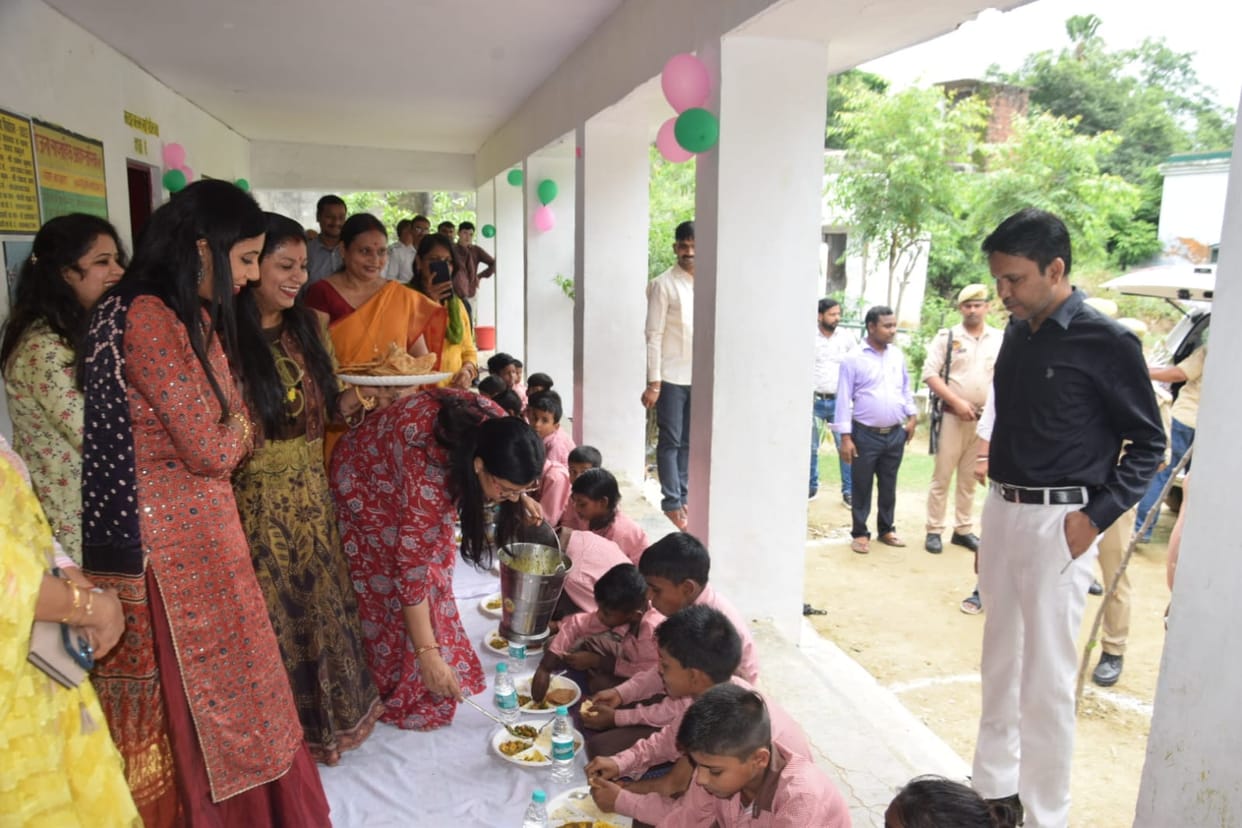 DM reached council school with wife, served food to children