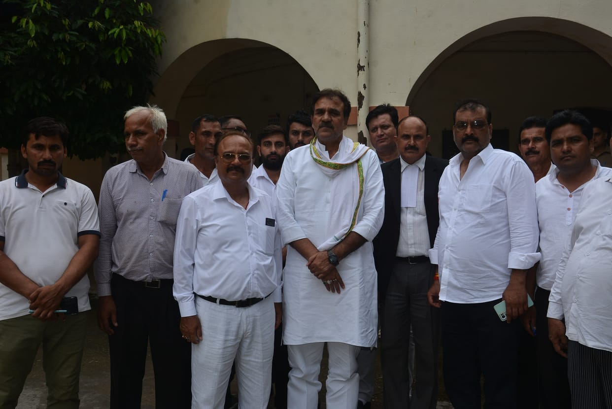 Former MLA fined one thousand rupees for playing drum