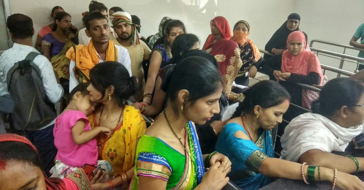 Patients stood for hours for registration and examination
