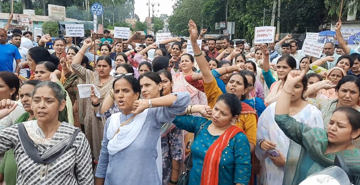 Striking clerks take out flag march