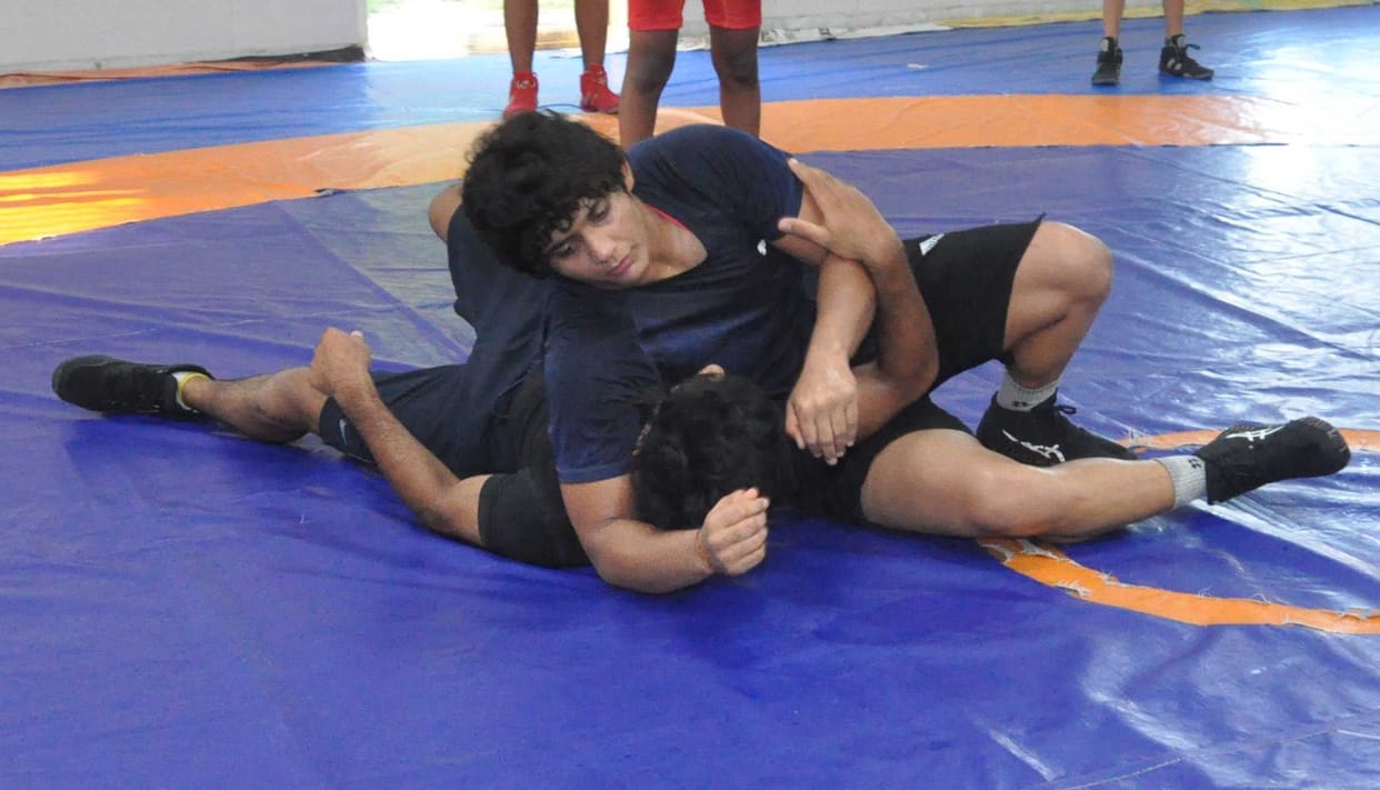 Kiran, who missed a medal five years ago, is now practicing with boys to increase her strength.