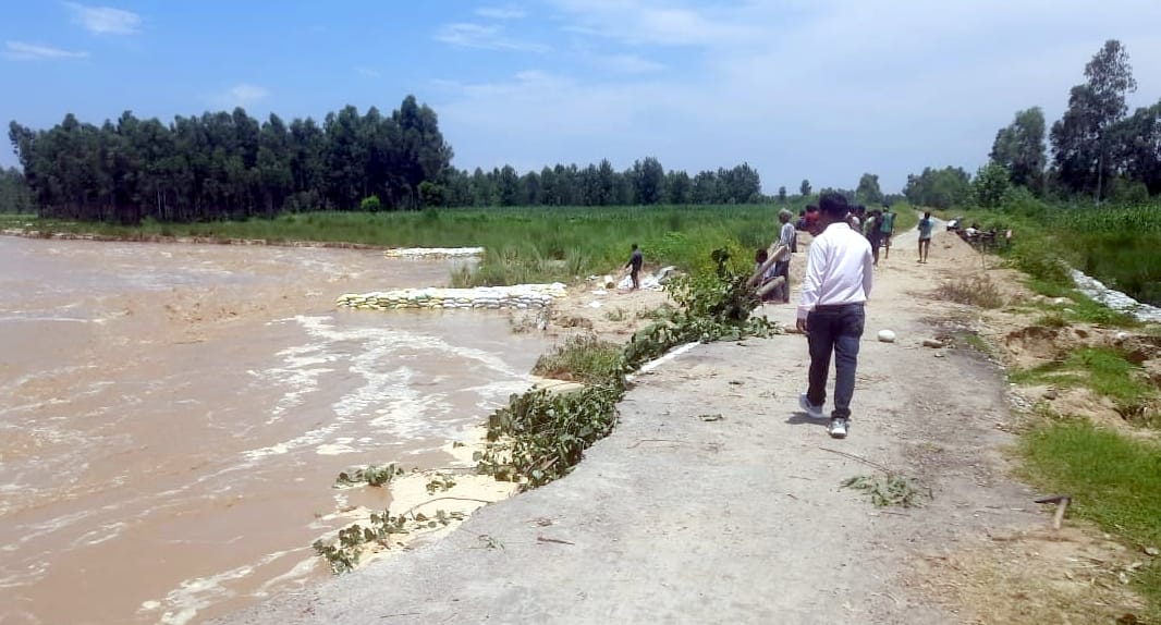 Embankment being put in place to stop the flow of Banaili river towards the canal