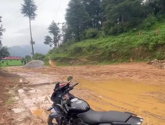 The road connecting Harinanda temple is in bad shape