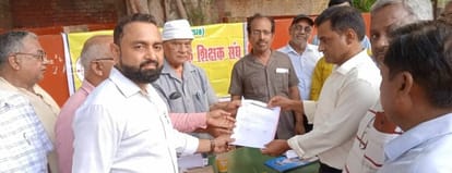 Teachers sitting on strike demanding restoration of old pension