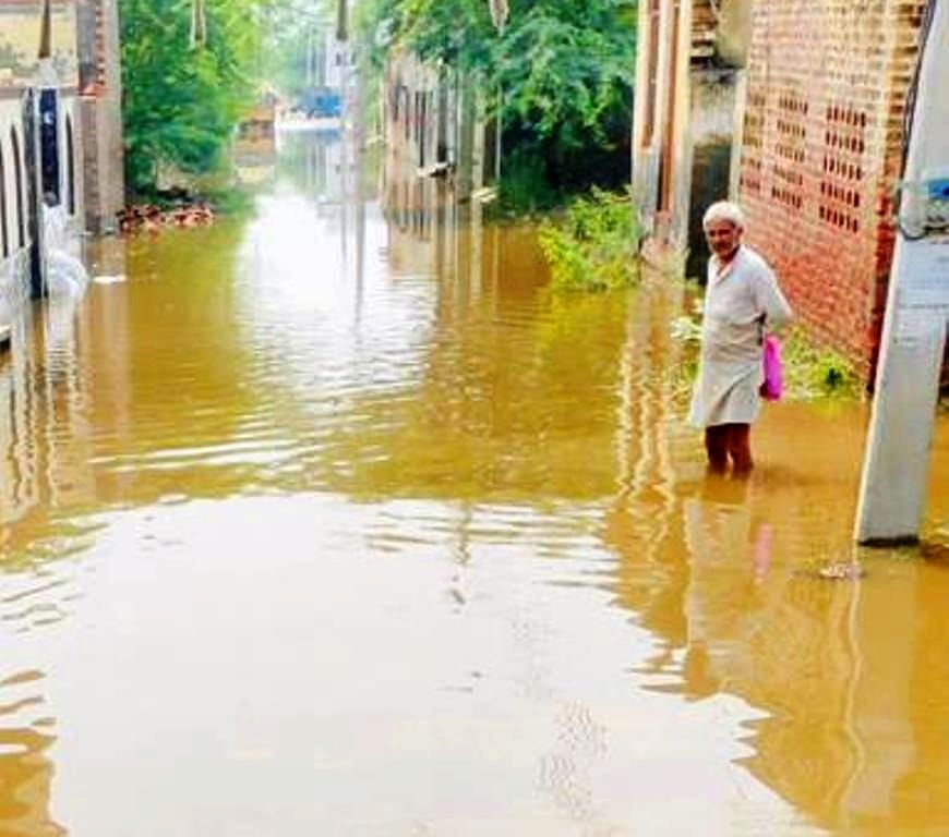 Rain water filled from farm to village