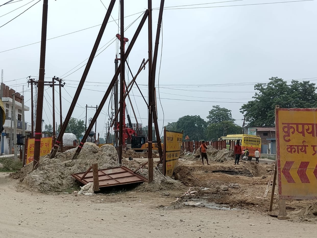 Electric poles became an obstacle in the way of under construction flyover