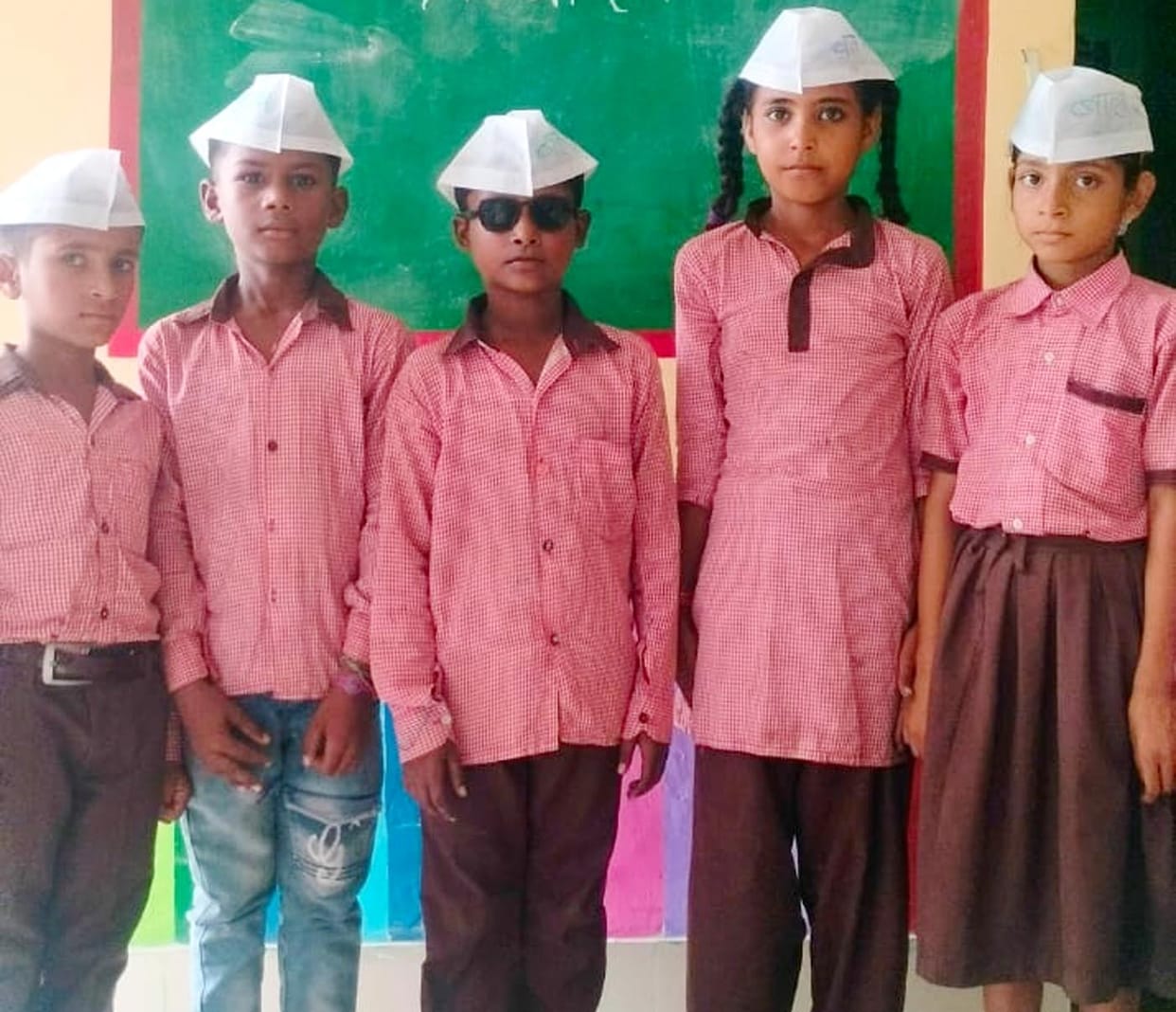 Children cast their votes in the election of the Children's Parliament