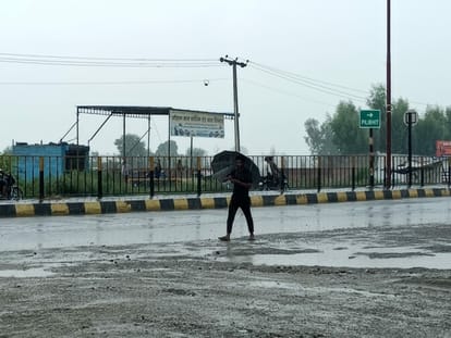 Half an hour's rain gave hours of trouble, roads became ponds