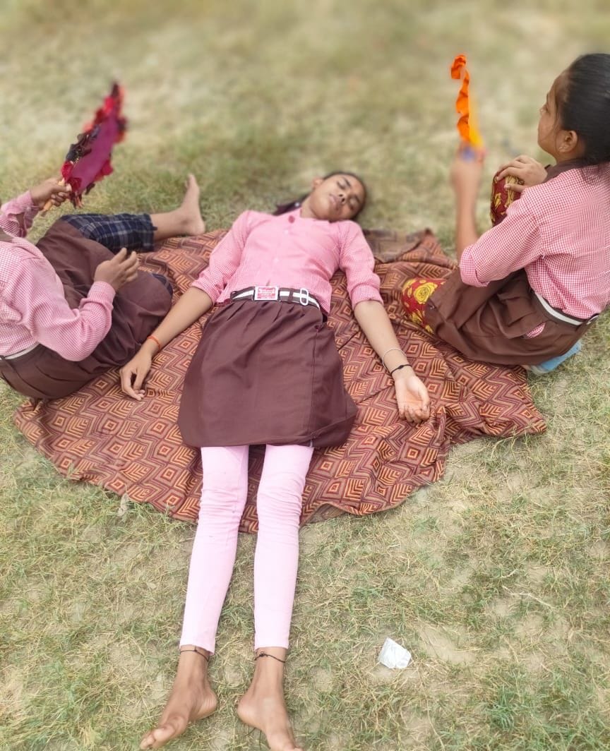 girl student fainted in class room due to heat