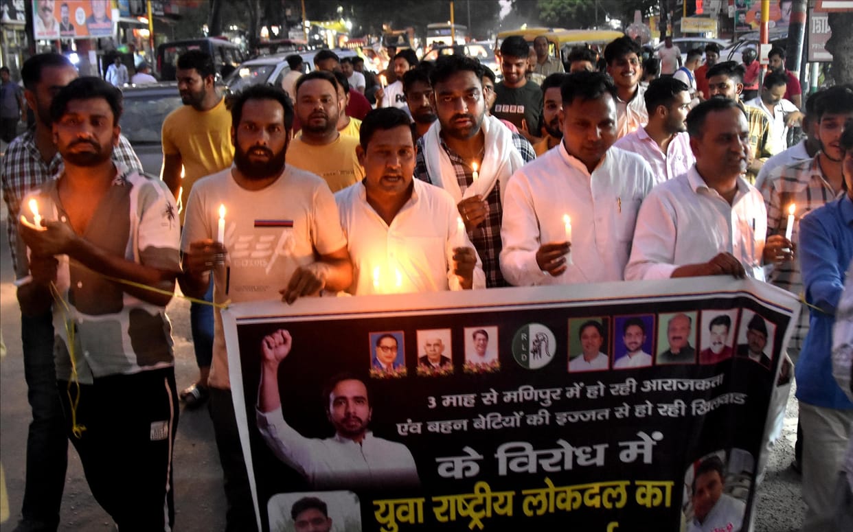 RLD workers take out candle march to protest against Manipur incident