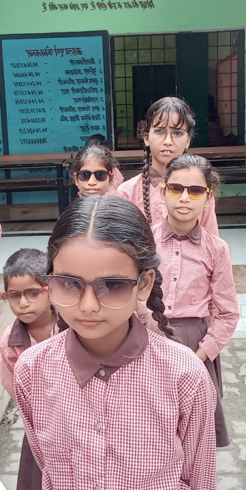 Reaching school wearing glasses to avoid eye flu