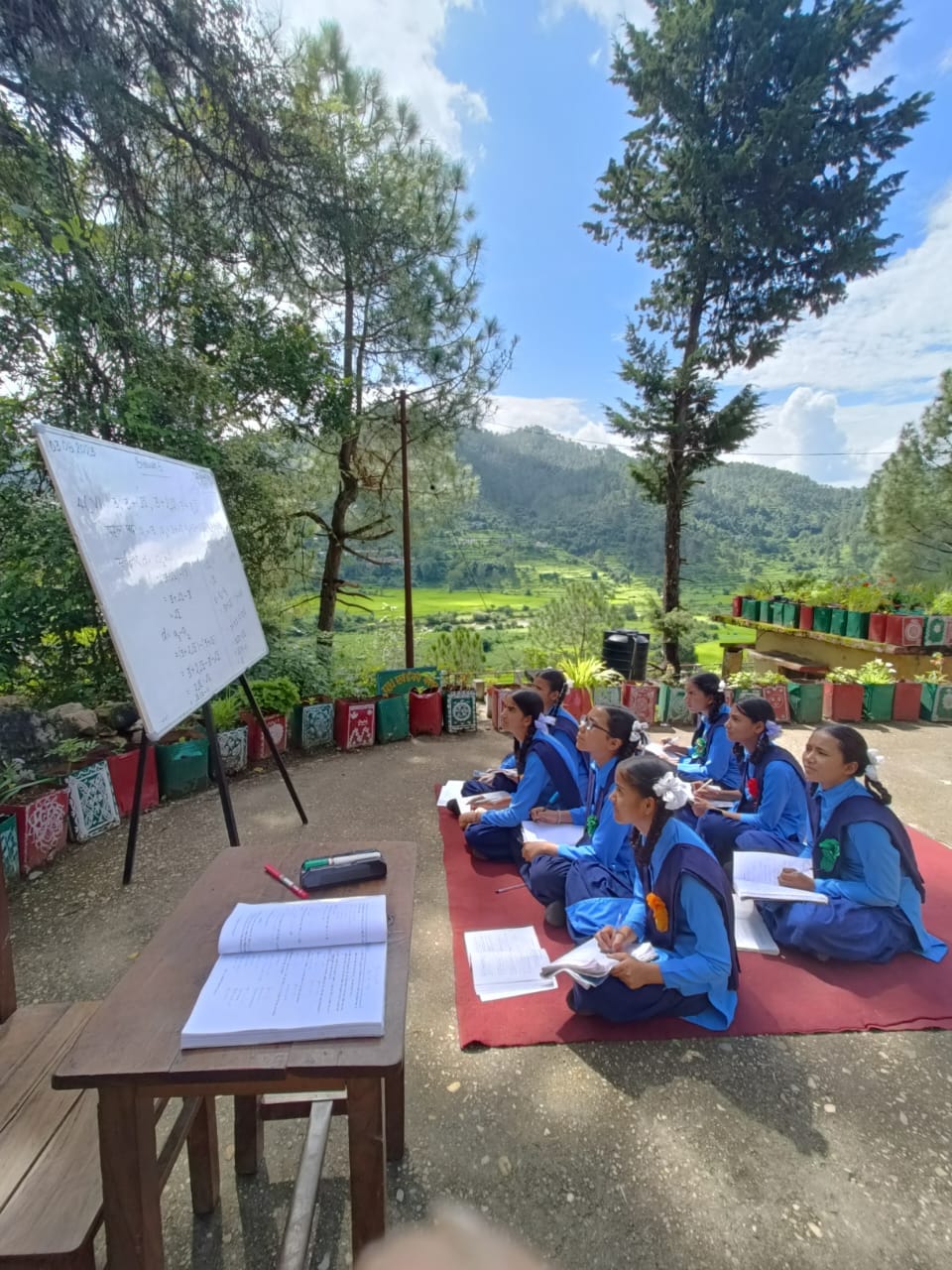 Daughters are making future sitting under the blue sky