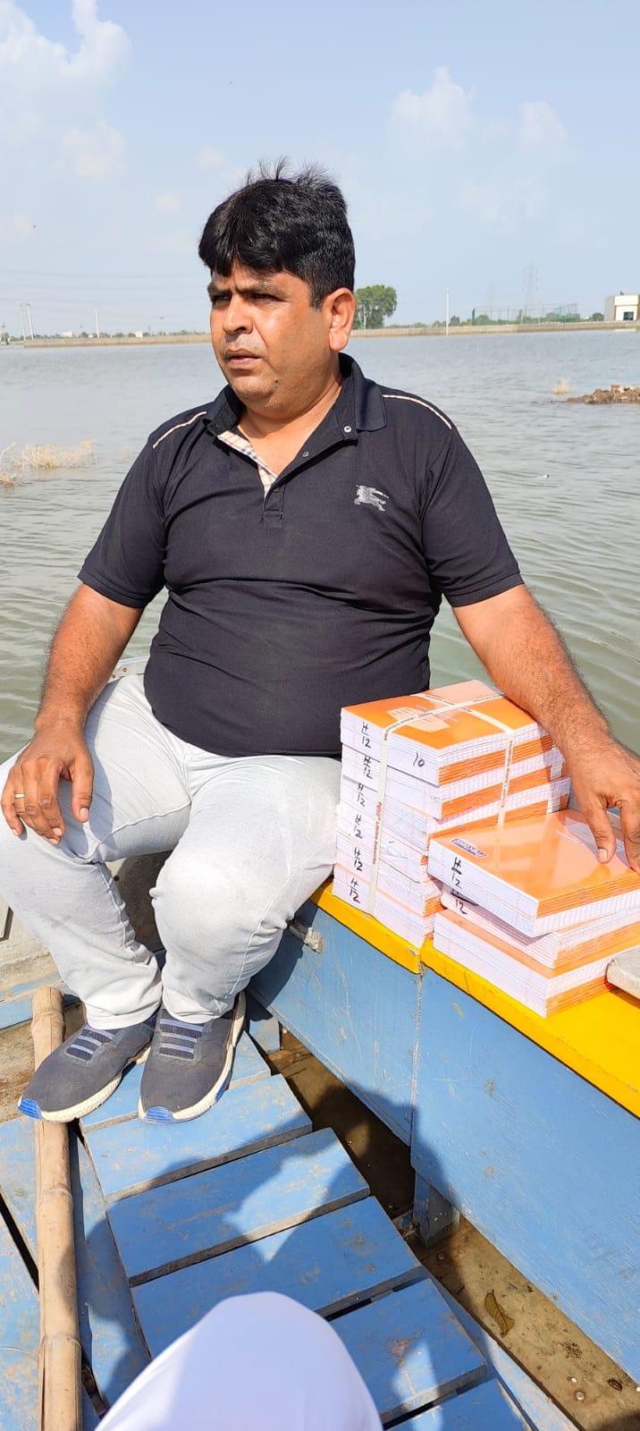 The flood stopped the education of the children, then reaching the boats lit up the light of education.
