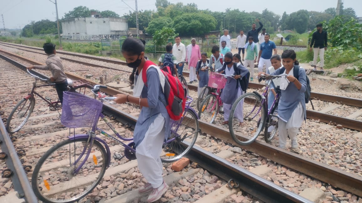Railway employees stopped from draining water from underpass