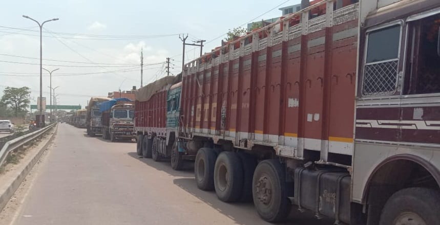 Frontline truck owners are checking documents of vehicles