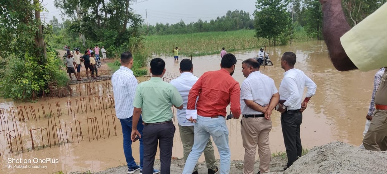 Instruct people to stay away from rivers due to storm