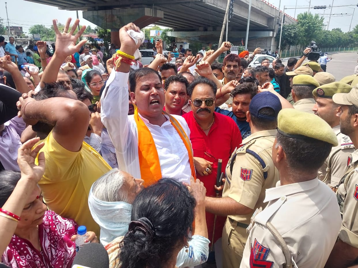 protest against smart meter in jammu city road blocked for two hours