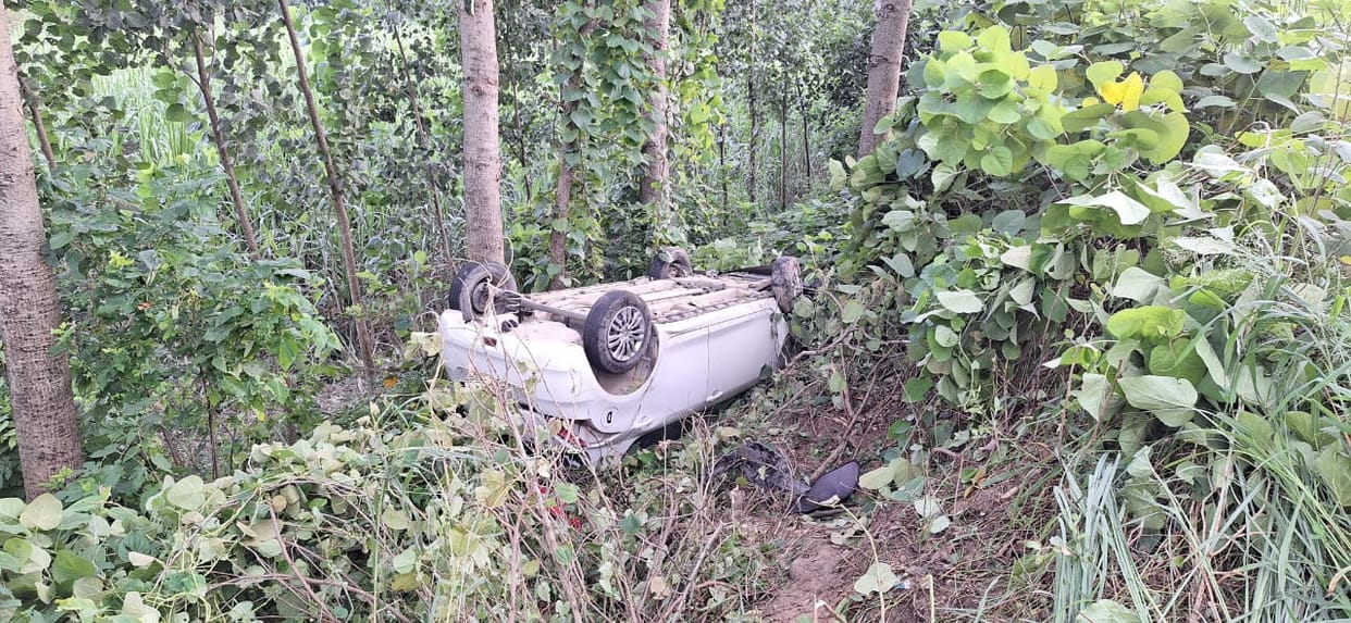 Unbalanced car overturned, driver injured