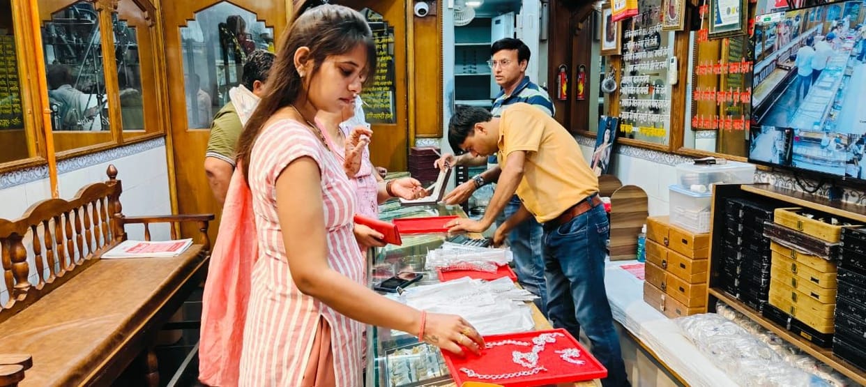 The brightness of gold and silver rakhis increased between silk threads