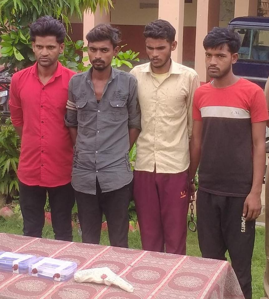 Four accused of robbing an employee arrested