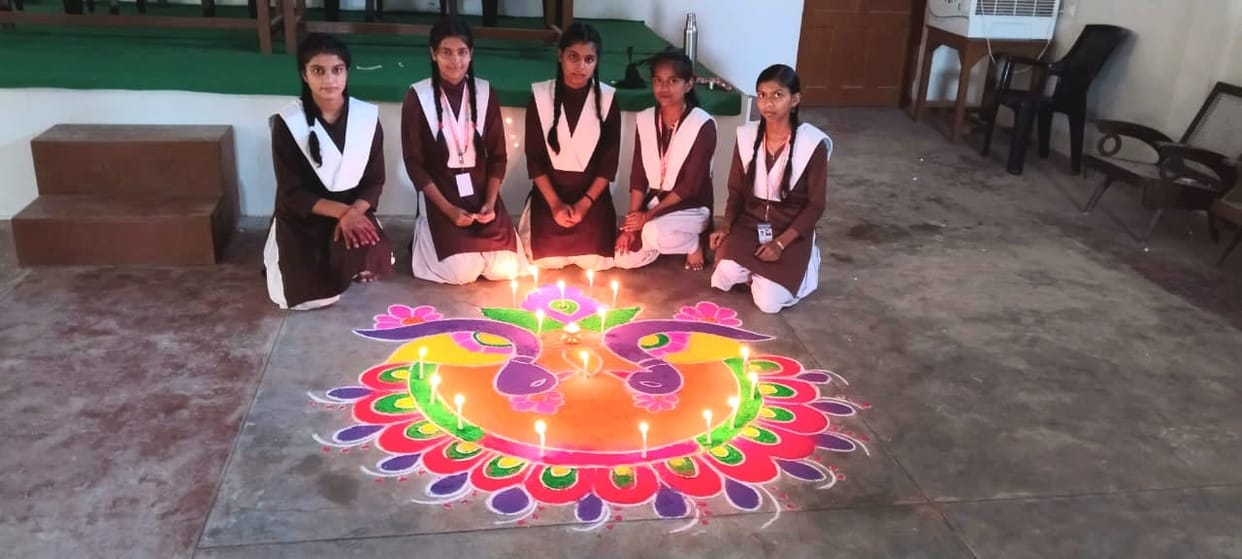 Girls show their skills in Rangoli competition