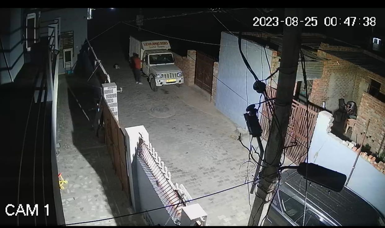 Pickup parked outside the house, incident caught on camera