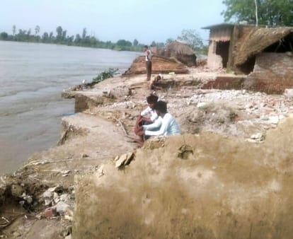 Many houses merged in the Ganges... many on the brink