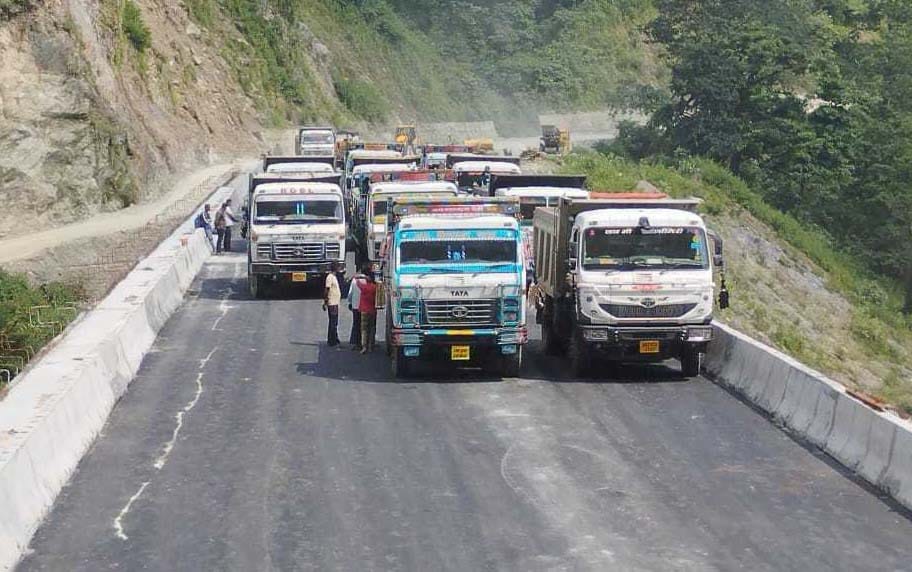 Load test of Chalthi's new bridge, 12 trucks parked on the bridge