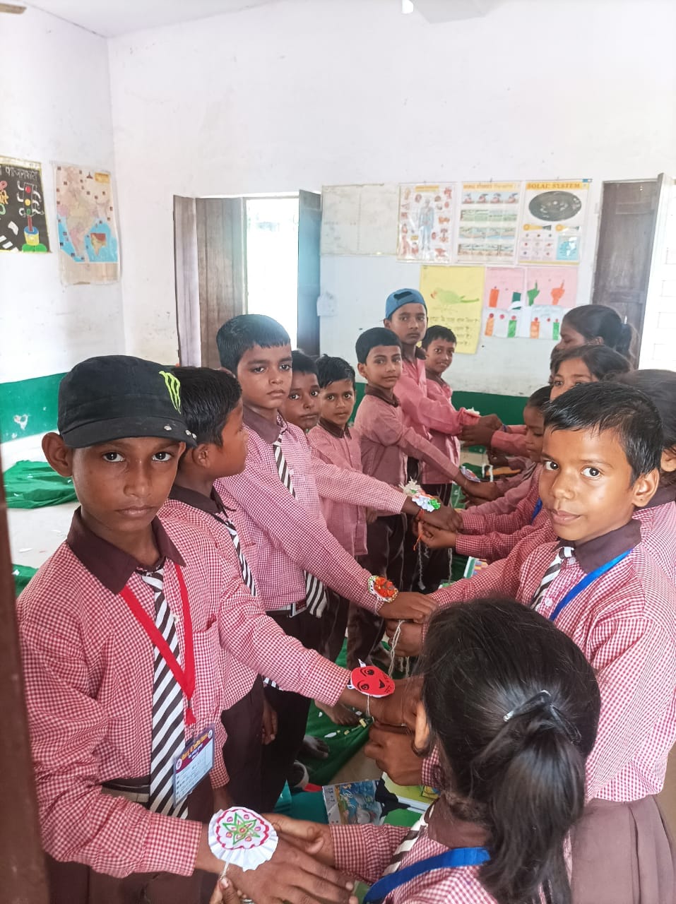 Girl students tied rakhi to their classmates