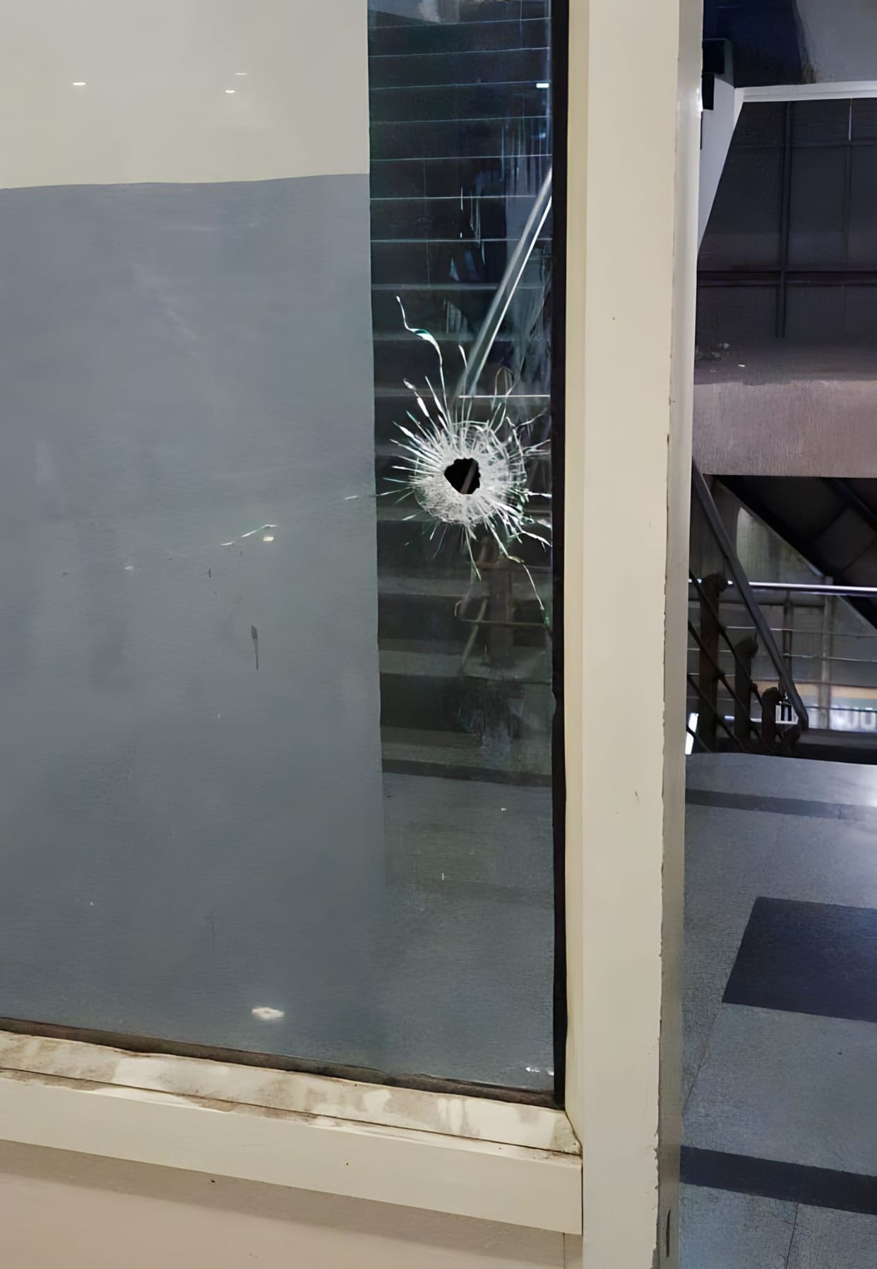Several rounds were fired outside The Rock Bar, bouncer injured