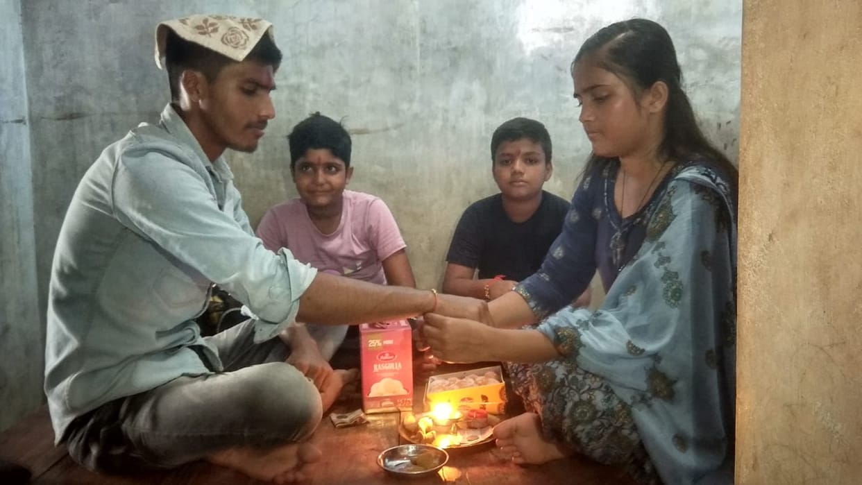 Sisters tie Rakhi on brothers' wrists, pledge to protect them with gifts