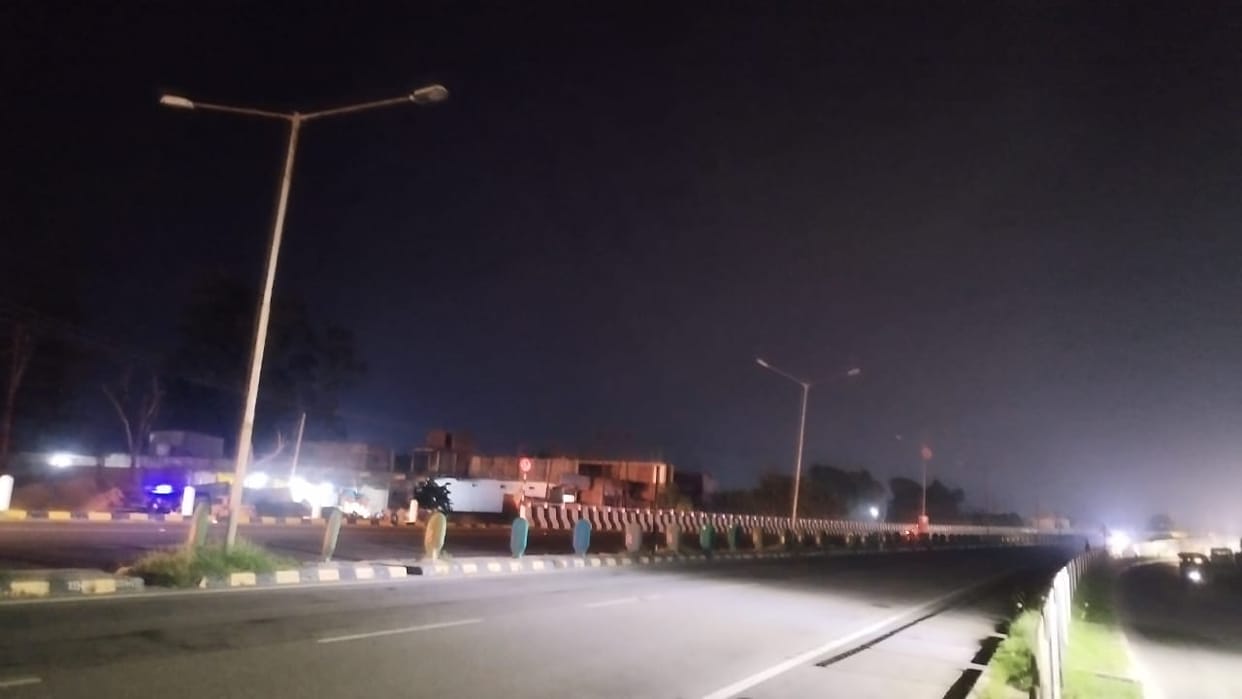 Highway overbridge lights broken, traveling in darkness