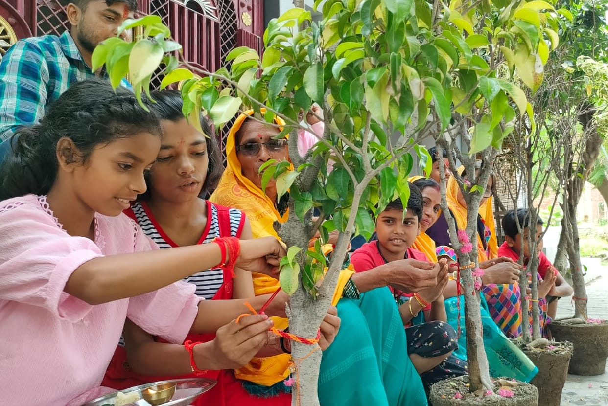 Pledged to protect environment by tying Rakhi to plants