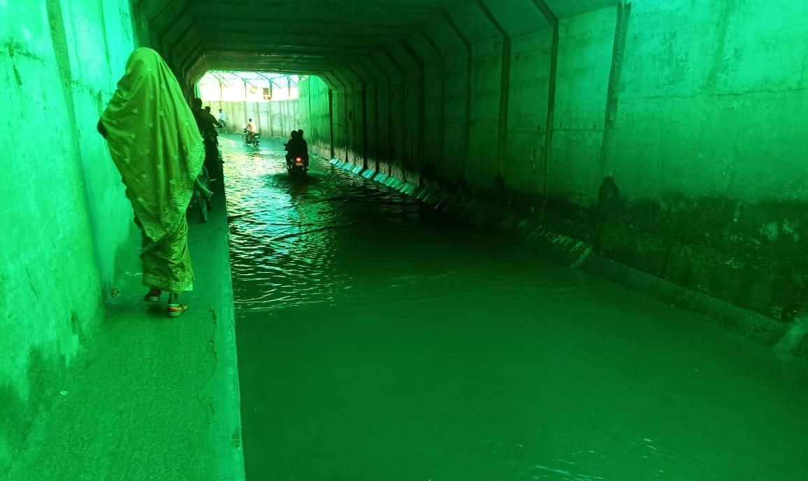 Rain water filled under Ahra railway underpass