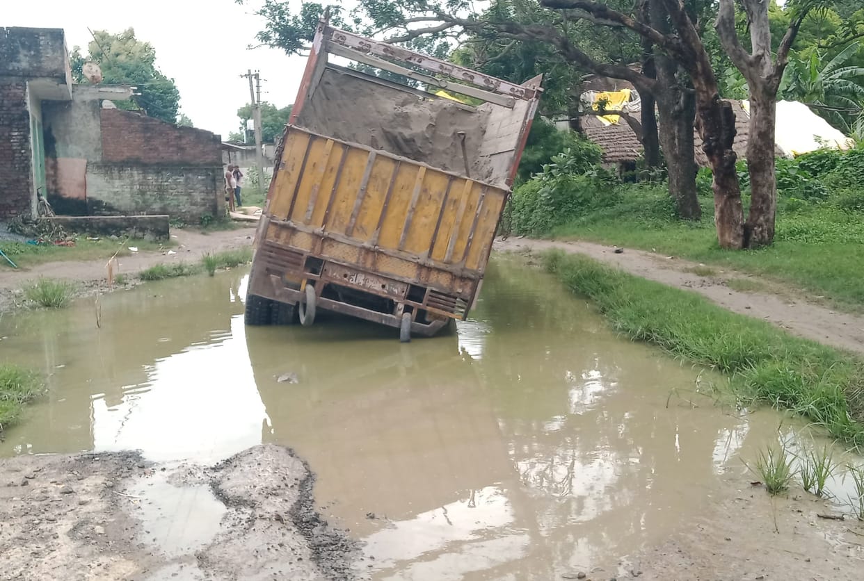 road covered in potholes
