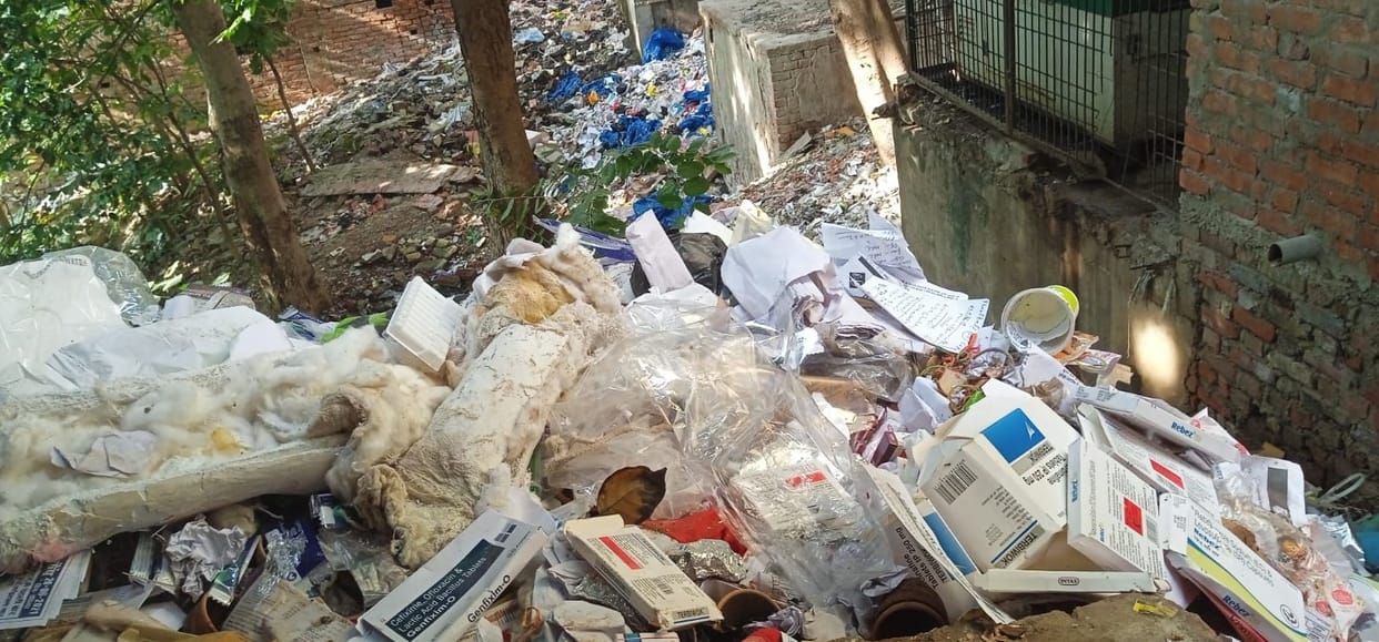 Health hazard...medical waste being thrown in the open