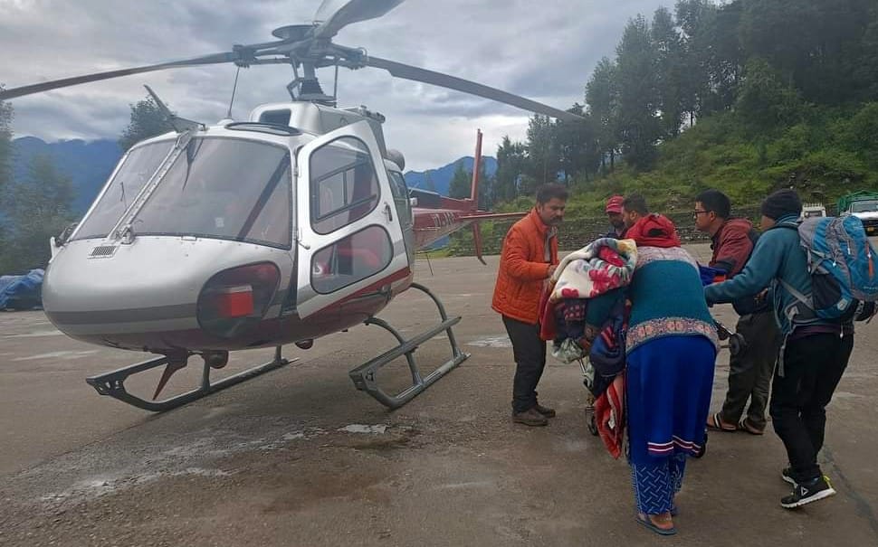 An unwell woman was taken to Pithoragarh by helicopter