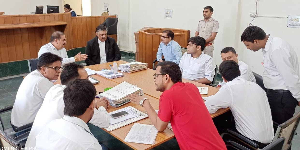 26,434 cases settled in National Lok Adalat