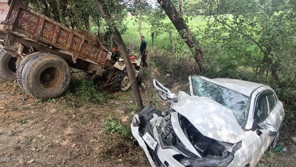 Tractor and car collide on highway, driver dead, six injured