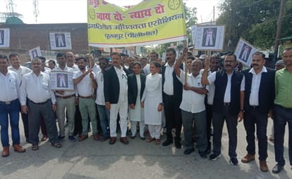 Lawyers took out a silent procession in Puranpur