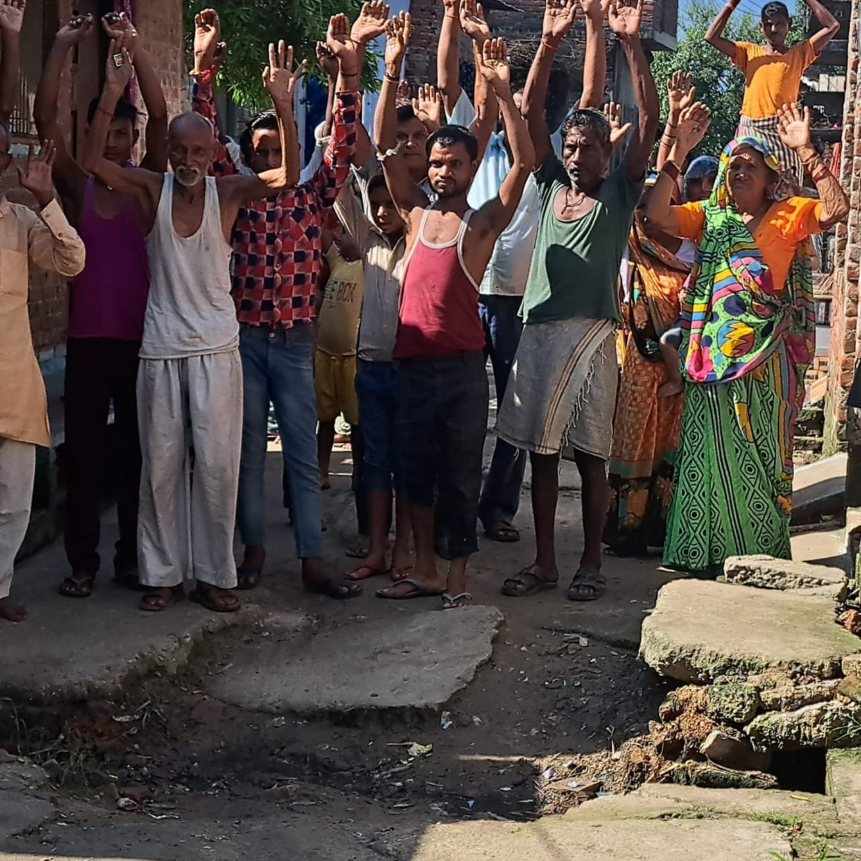 Road dug up, villagers demonstrate in protest